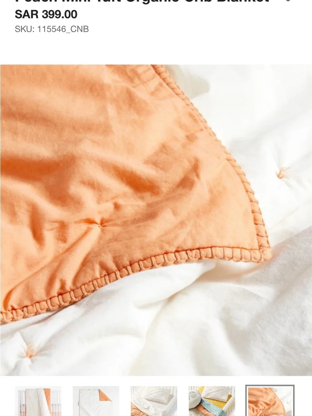 Crate and Barrel, Crate and Kids mini tufted crib quilt. Peach color